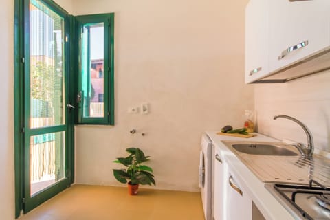 Standard House, 2 Bedrooms (Villetta Arancio 350 Meters From The) | Private kitchen | Fridge, oven, stovetop, coffee/tea maker