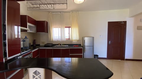 Family Apartment | Private kitchen | Fridge, microwave, cookware/dishes/utensils