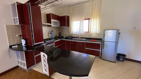 Family Apartment | Private kitchen | Fridge, microwave, cookware/dishes/utensils