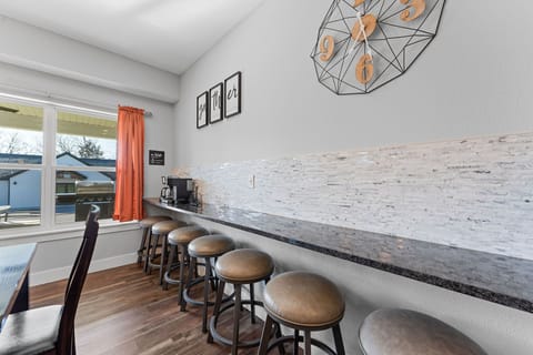 Dining Area with Additional Bar Top Seating