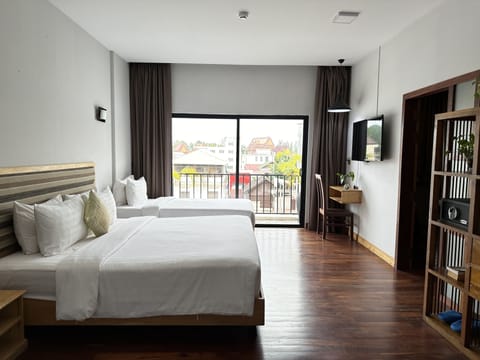 Family Suite, 1 Bedroom, Balcony, City View | Minibar, in-room safe, desk, laptop workspace