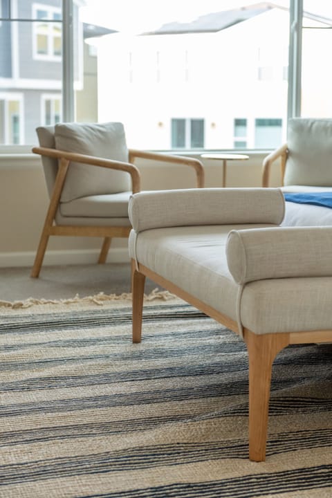 Plush end stool and seating area for the bedroom