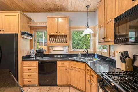 Cook like a pro in this fully stocked kitchen! With all the cookware, dishes, and even a Keurig for your morning coffee, it's got everything you need to feel at home.