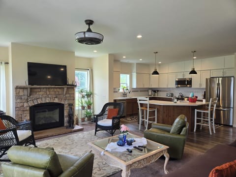 Bright & cozy living area with fireplace