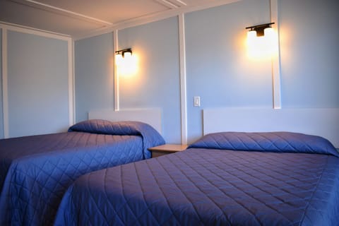 Deluxe Quadruple Room | Free WiFi, bed sheets