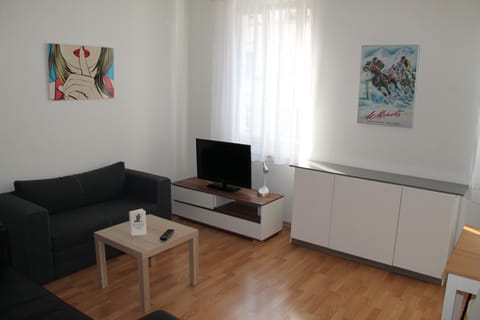 Apartment, 2 Bedrooms | Living area | 22-inch flat-screen TV with cable channels, TV