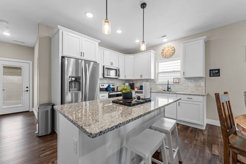Full Kitchen with Major Appliances & Bar Seating