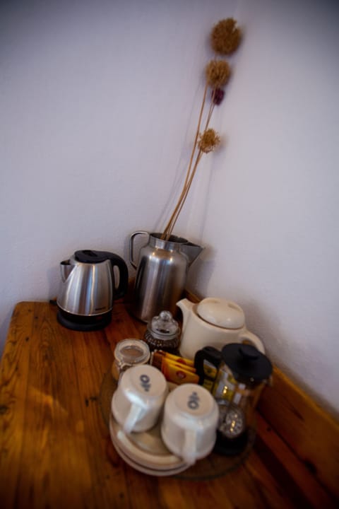 Tea & coffee making facilities with mini fridge in every room