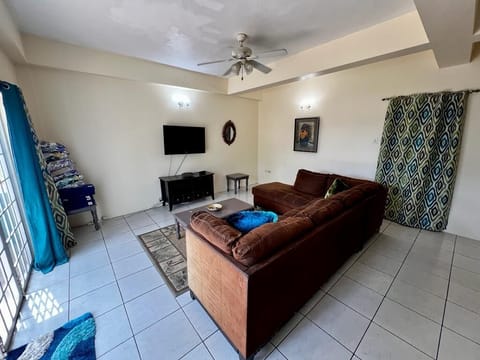 Executive Apartment, 2 Bedrooms, Beach View | Living area | 52-inch Smart TV with cable channels