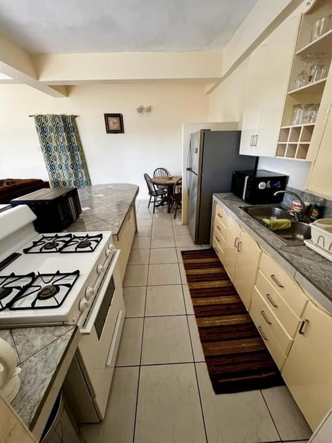 Executive Apartment, 2 Bedrooms, Beach View | Private kitchen | Full-size fridge, microwave, oven, dishwasher