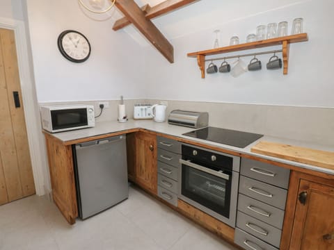 Fridge, electric kettle, toaster, cookware/dishes/utensils