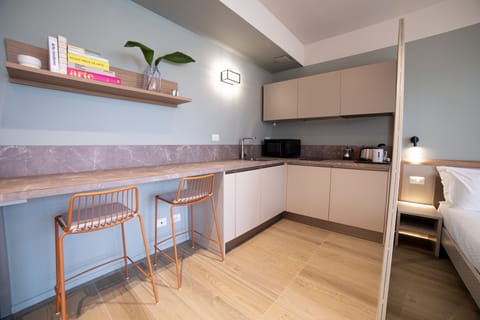 Studio, Terrace | Private kitchen | Stovetop, coffee/tea maker, toaster, highchair