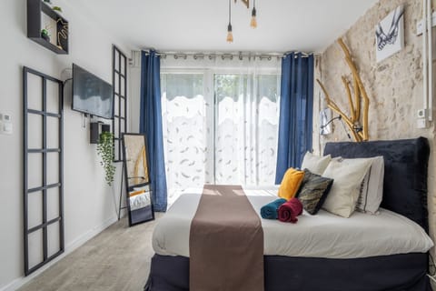 Tic Tac Room | Individually decorated, individually furnished, blackout drapes