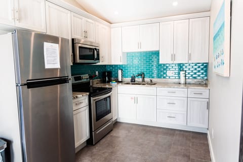 Superior Apartment | Private kitchen | Microwave, toaster, highchair, cookware/dishes/utensils