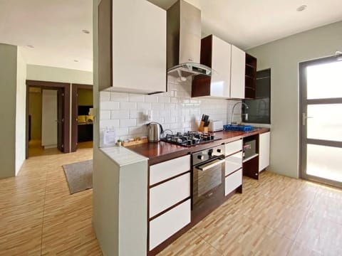 Standard Apartment | Private kitchen | Full-size fridge, microwave, oven, stovetop