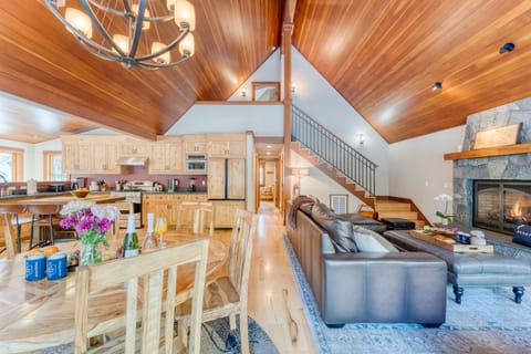 Dining table locates near the kitchen and living area.