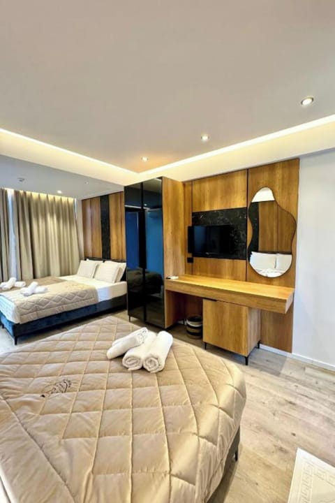 Deluxe Quadruple Room, Hot Tub | Free WiFi