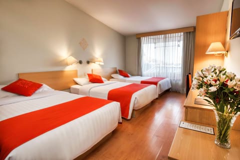 Standard Triple Room | Premium bedding, minibar, in-room safe, individually decorated