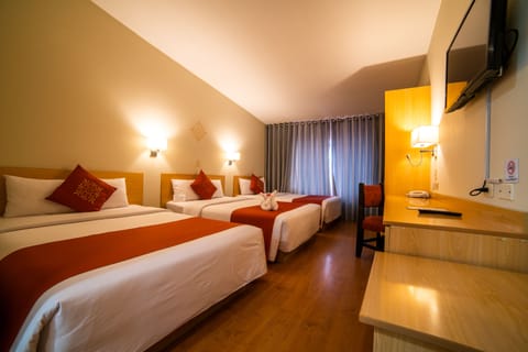 Standard Triple Room | Premium bedding, minibar, in-room safe, individually decorated