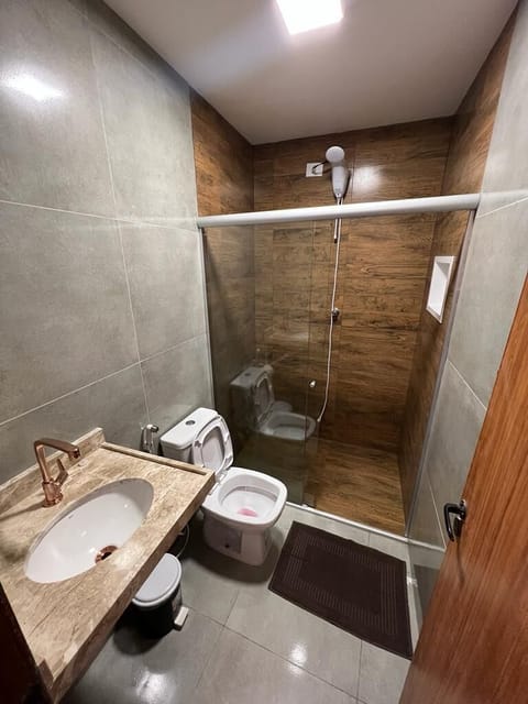 Basic Quadruple Room | Bathroom | Shower, free toiletries, towels, soap