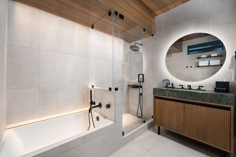 Deluxe Studio, Balcony | Bathroom | Separate tub and shower, rainfall showerhead, hair dryer, bathrobes