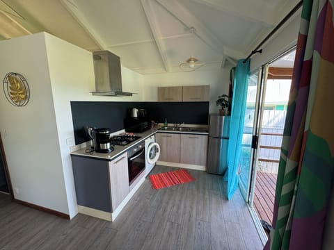 Junior Bungalow, 2 Bedrooms | Private kitchen | Full-size fridge, microwave, oven, electric kettle