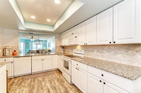 Condo, Multiple Beds, Pool View (Anna Maria Island Beach Waves) | Private kitchen | Highchair