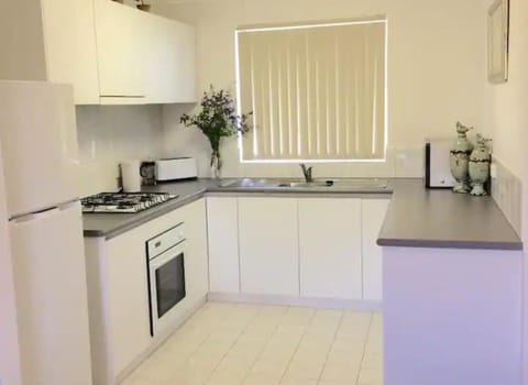 Basic Apartment | Private kitchen | Full-size fridge, dishwasher, cookware/dishes/utensils