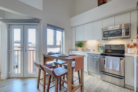 Premium Penthouse | Private kitchen | Full-size fridge, microwave, oven, stovetop