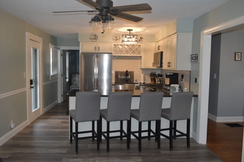 This kitchen will welcome you with new appliances, granite countertops