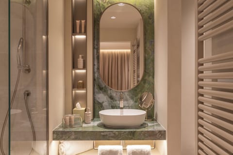 Shower, free toiletries, hair dryer, bathrobes