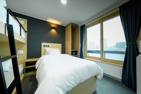 Triple Room - City View | In-room safe, soundproofing, iron/ironing board, free WiFi