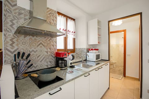 Standard Apartment, 1 Bedroom (Lami Apartment Intra Center) | Private kitchen | Microwave, stovetop, cookware/dishes/utensils