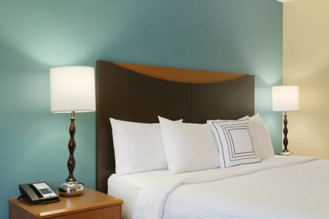 Pillowtop beds, desk, blackout drapes, iron/ironing board