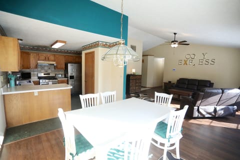 Dinette with kitchen to the left and Living Room to the right