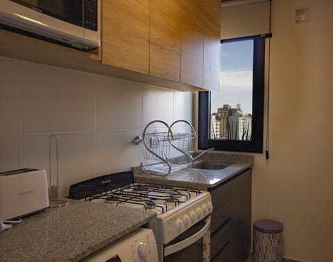 Superior Apartment | Private kitchen | Electric kettle, dining tables