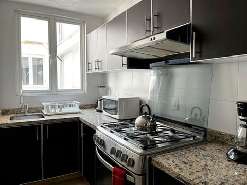 Comfort Apartment | Private kitchen | Full-size fridge, microwave, oven, coffee/tea maker