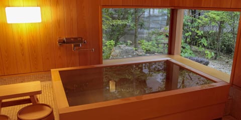 Japanese-Style Luxury Triple Room with Garden View,Non Smoking | Bathroom | Hair dryer, towels