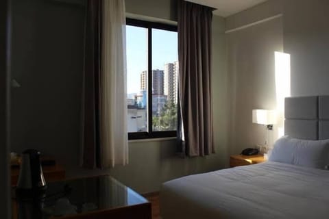 Deluxe Double Room | In-room safe, desk, laptop workspace, blackout drapes