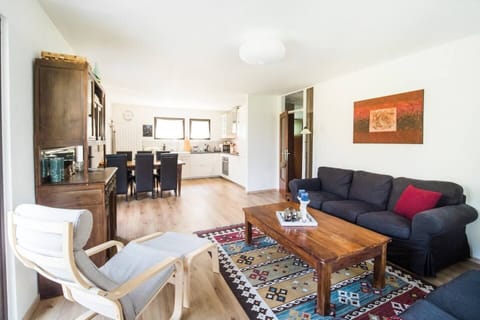 Living room with dining room and kitchen