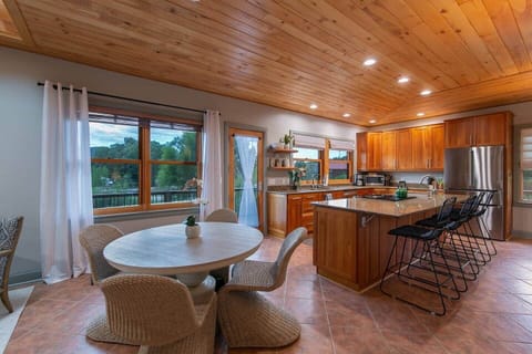 Modern kitchen with mountain views and updated appliances.