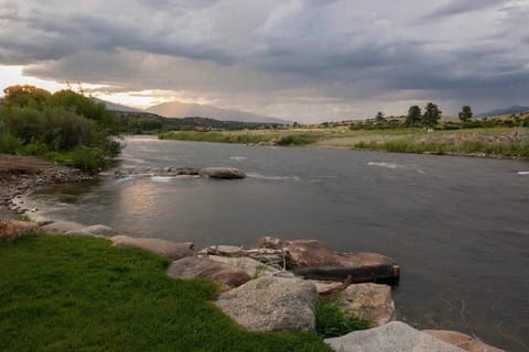 Scenic riverbank, great for fishing, photography, or quiet reflection.