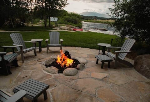 Cozy riverside fireplace with stunning Arkansas River views.