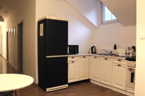 Full-size fridge, microwave, stovetop, griddle