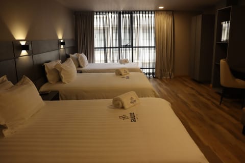 Deluxe Triple Room | Premium bedding, down comforters, minibar, individually decorated