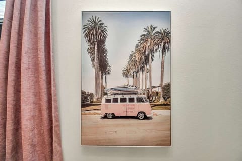 Cute artwork adds a touch of comfort to the room.