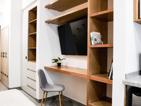 City Studio, 1 King Bed with Sofa bed, Balcony | Living area | 55-inch Smart TV with digital channels, Netflix, streaming services