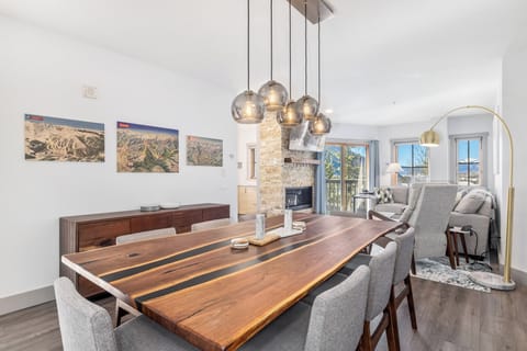 Dining room table & chandelier ski map artwork, and globe chandelier (seats 10)