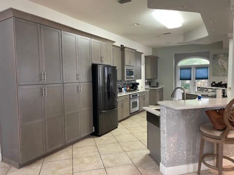 Signature House, 6 Bedrooms, Balcony | Private kitchen | Fridge, microwave, oven, stovetop