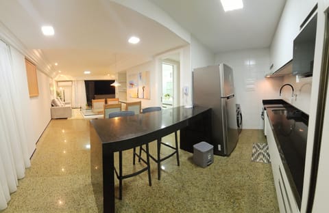 Elite Apartment | Private kitchen | Full-size fridge, microwave, cookware/dishes/utensils